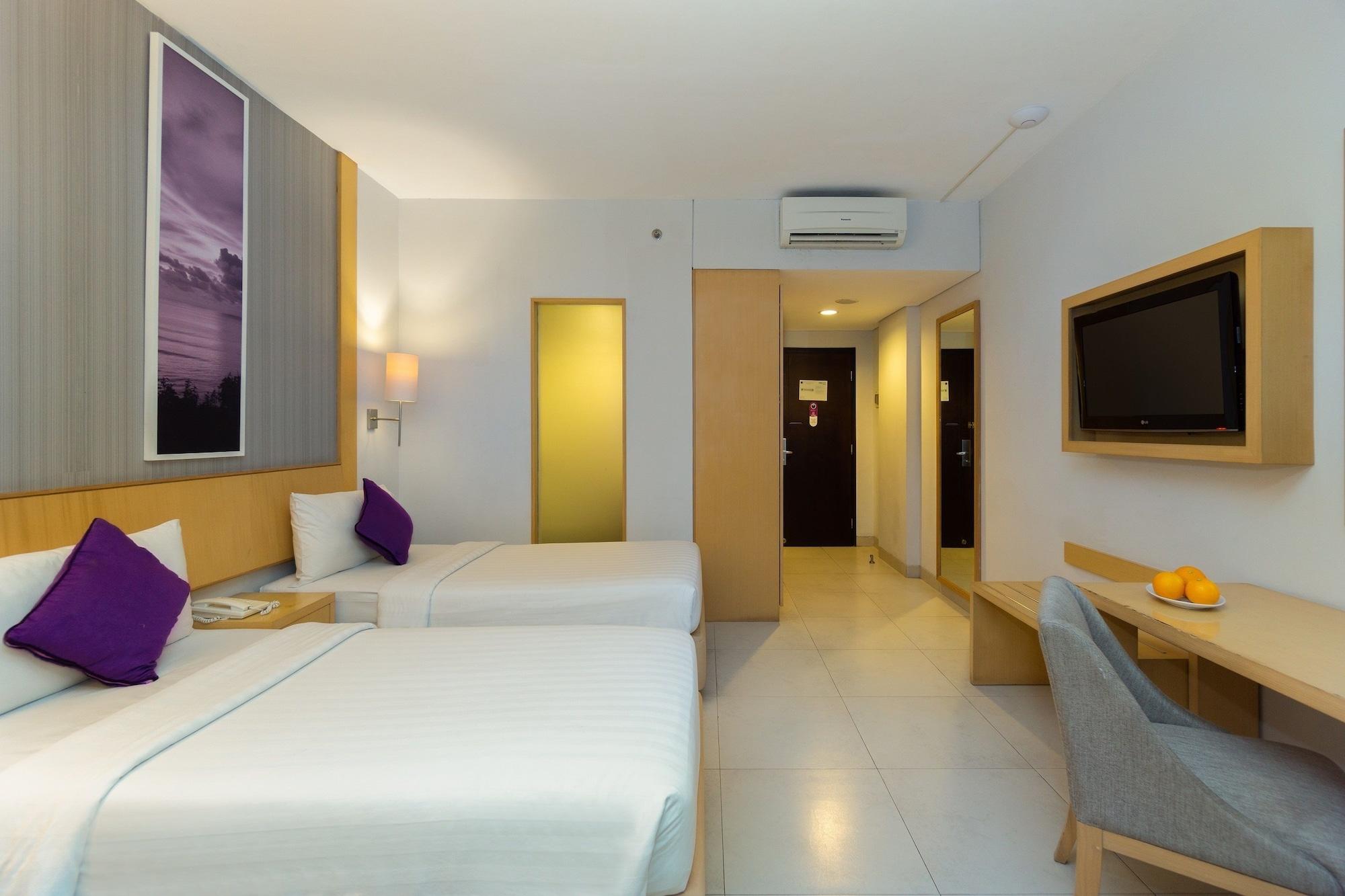 Quest Hotel Kuta By Aston Esterno foto