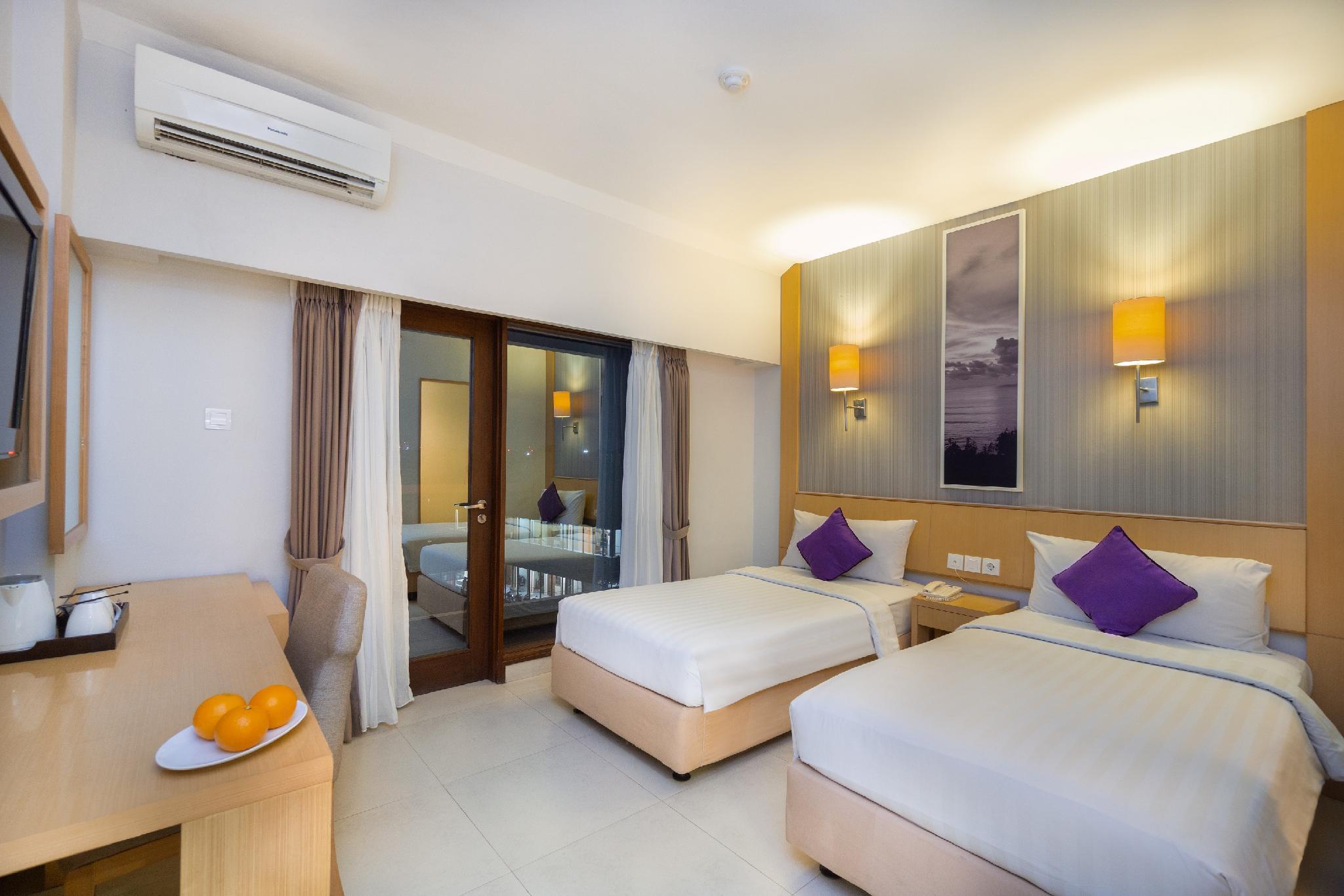 Quest Hotel Kuta By Aston Esterno foto