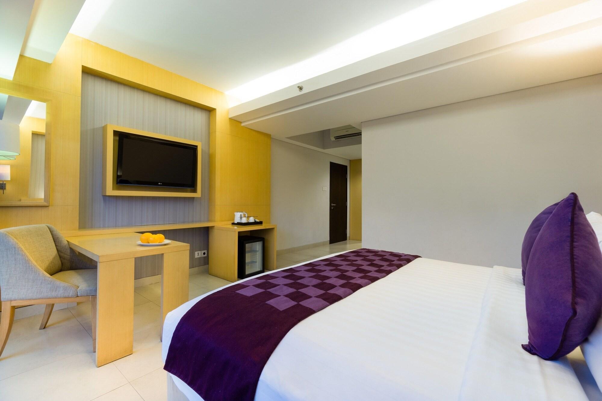 Quest Hotel Kuta By Aston Esterno foto