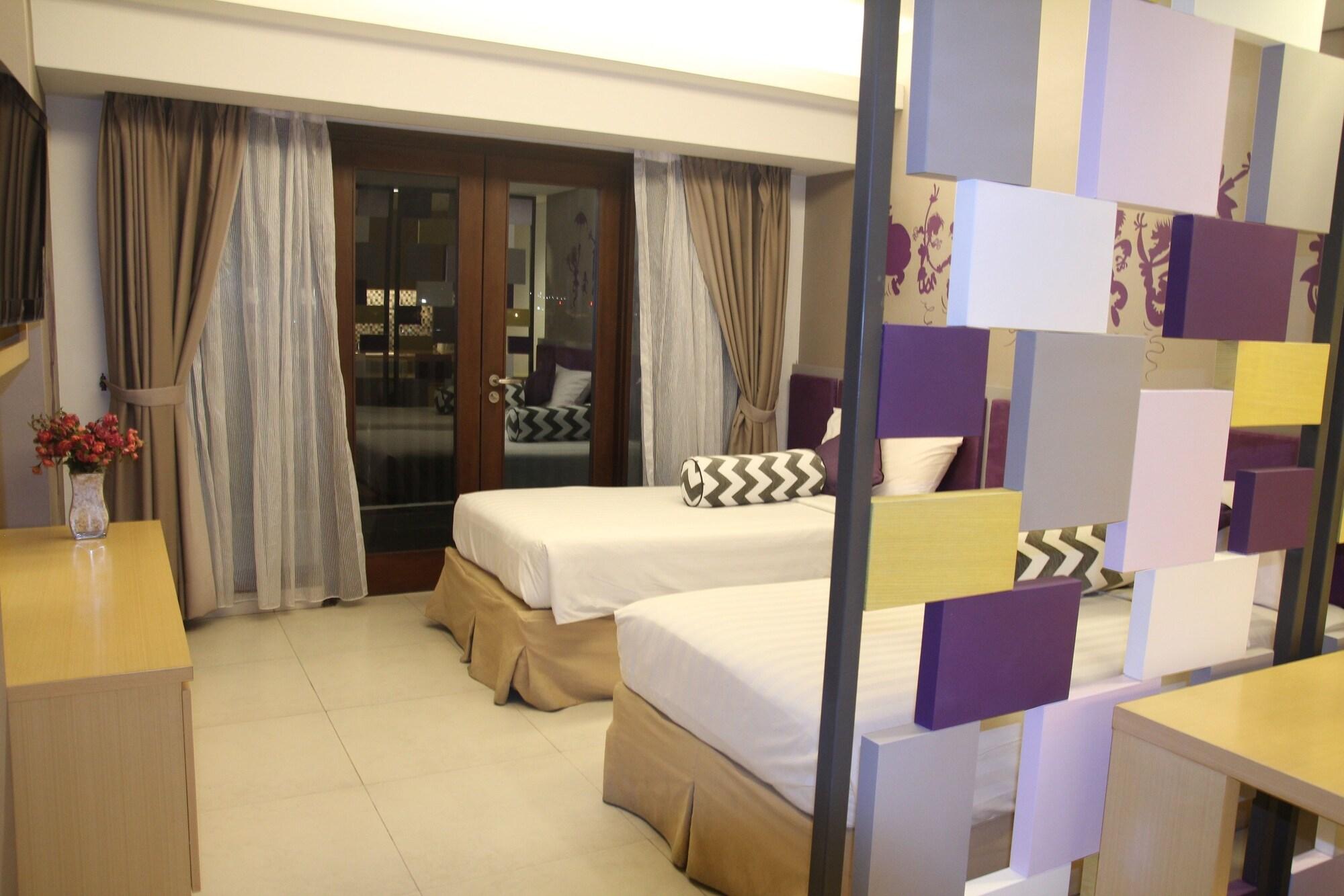 Quest Hotel Kuta By Aston Esterno foto