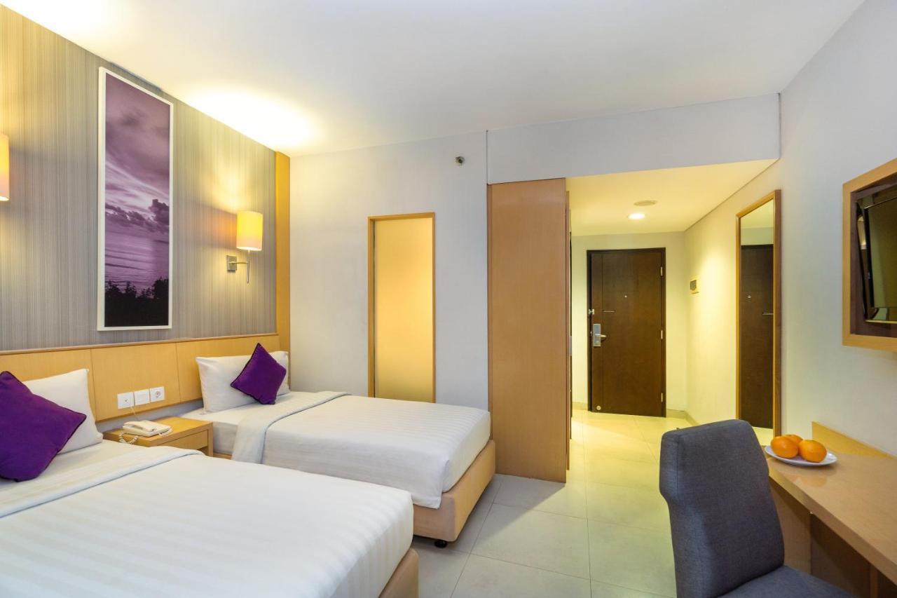 Quest Hotel Kuta By Aston Esterno foto
